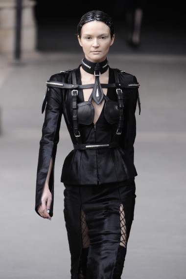 Paris, France - March 08: Models walk to the runway as Alexander McQueen prepares to wear the Winter 2011 Fall 2012 show during Paris Fashion Week on a special plane at La Franc on March 8, 2011 in Paris