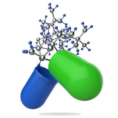 在與膠囊丸和分子手中的聽診器