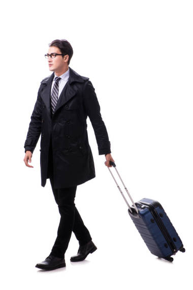 年轻的商人与手提箱准备商务旅行白色