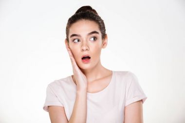漂亮的女人, 棕色的頭發(fā)在包子觸摸她的臉表達