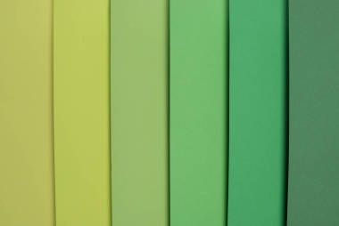 柔和綠色和淡綠色彩色條紋背景