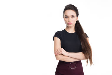 有吸引力的婦女?dāng)[著交叉的武器, 孤立的白色