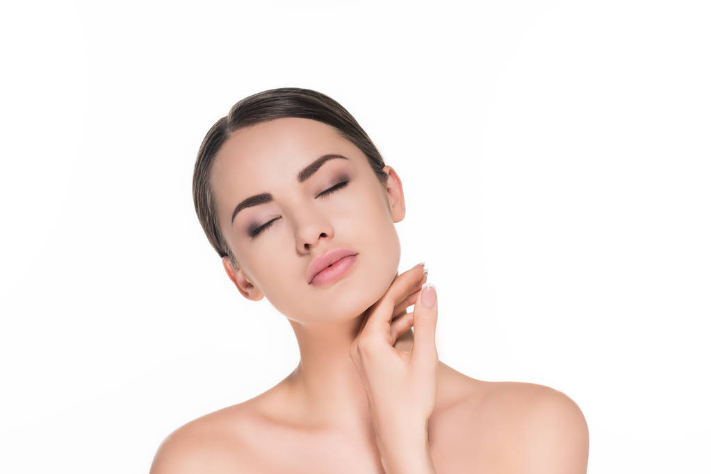 性感的年轻女子触摸她完美的皮肤隔离白色 性感的年轻女子触摸她完美的皮肤隔离白色