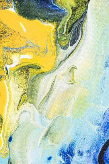 帶有黃色和藍(lán)色丙烯酸顏料的抽象紋理