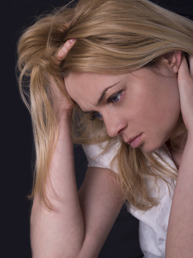 年輕的、 悲傷的婦女的肖像