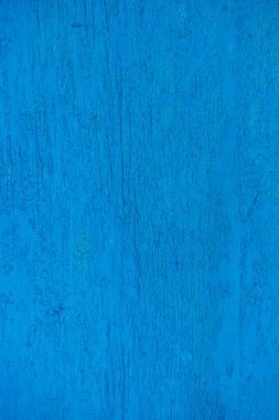 蓝色墙壁纹理为背景。旧剥漆