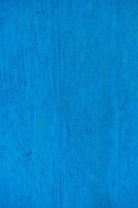 蓝色墙壁纹理为背景。旧剥漆