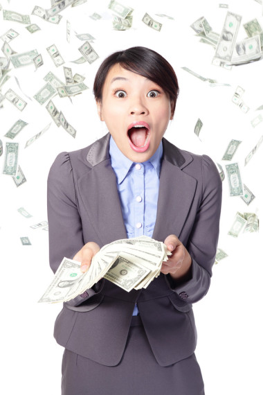 女人驚訝與下跌錢的臉圖片