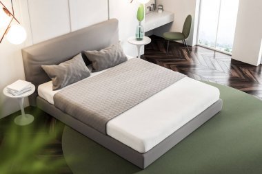 臥室內(nèi)有白色的墻壁, 一層有地毯的木地板, 一張雙人床和一張床頭柜, 上面有書(shū)。3d 渲染模擬