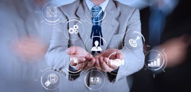 在虛擬流程圖中使用工作流自動(dòng)化圖和齒輪進(jìn)行業(yè)務(wù)流程管理. 商人手選人圖標(biāo)為人力資源理念