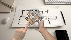 增强的现实概念。手持智能手机与 Ar 应用用于模拟3d 弹出式交互式住宅地图的生活