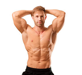 年轻英俊健美男子摆出肌肉的外