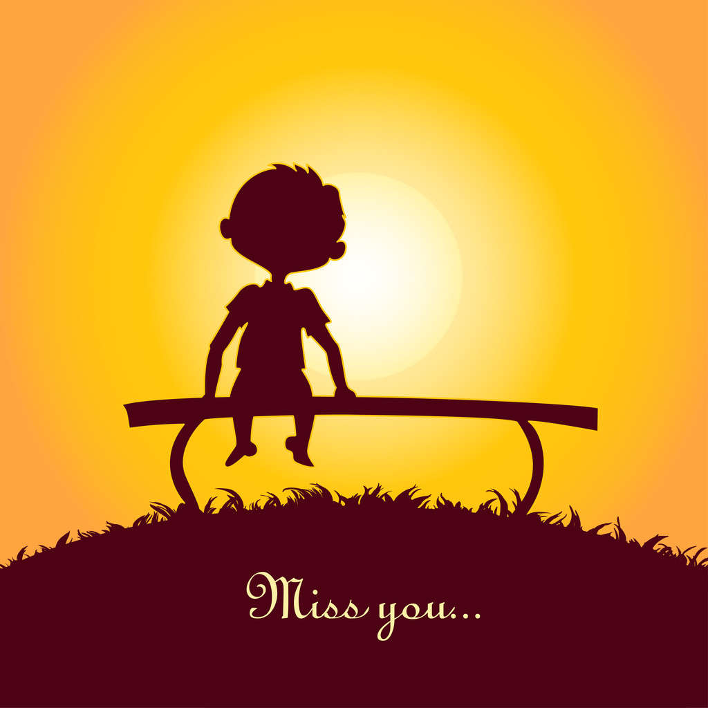 落日下的一个孤独的男孩的剪影 落日下的一个孤独的男孩的剪影