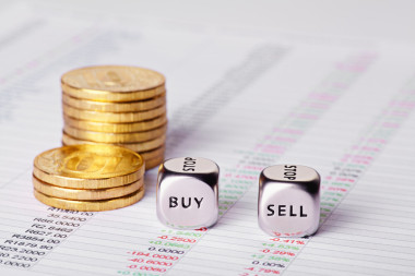 圖表、 硬幣和丁多維數(shù)據(jù)集以詞賣買。選擇性 focu