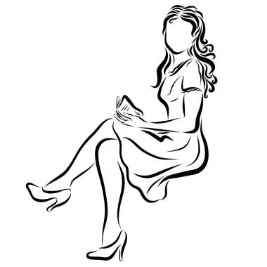 美麗的女孩在禮服與書在手