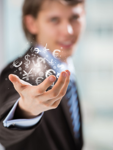 投资理念。英俊商务男人与货币符号