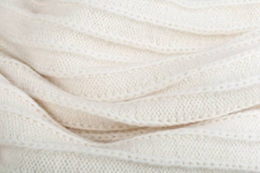 毛衣或圍巾織物紋理大型針織。針織的衫背景與救濟(jì)模式。羊毛手機(jī)，手工制作