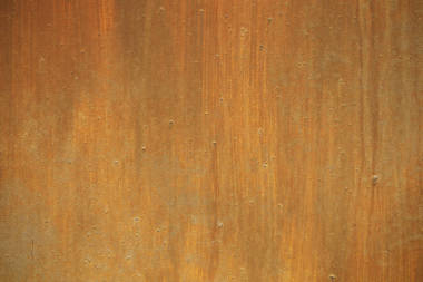 旧的锈迹斑斑的车库背景图像