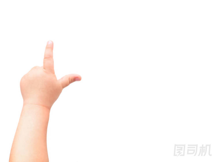 白色背景上的孩子的手。孩子用食指指著某物。平鋪，頂視圖，復(fù)制空間