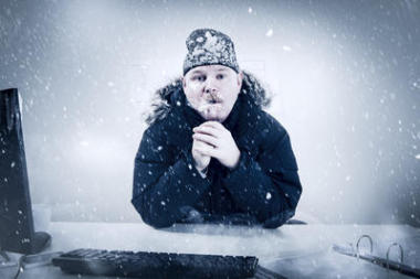冷辦公室與雪和冰的商人圖片
