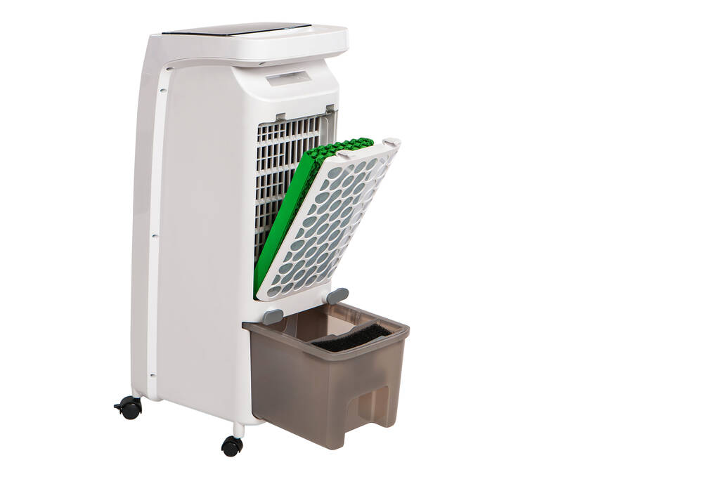 空气净化器的特写. 用白色底座上的轮子冲洗空气. 可替换的过滤器。 空气净化器的替换弹药筒。 家用电器配件的销售 空气净化器的特写. 用白色底座上的轮子冲洗空气. 可替换的过滤器。 空气净化器的替换弹药筒。 家用电器配件的销售