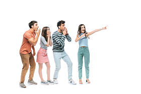 震惊的朋友们指着白色上孤立的东西 