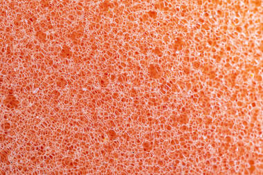 橙色海绵细密质感，海绵质感背景。Closeup, macro