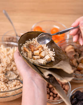 Zongzi, an ingredient for Chinese dumplings, is placed on a table at home during the Dragon Boat Festival celebration