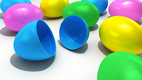 塑料复活节的彩蛋收藏在一个白色的背景