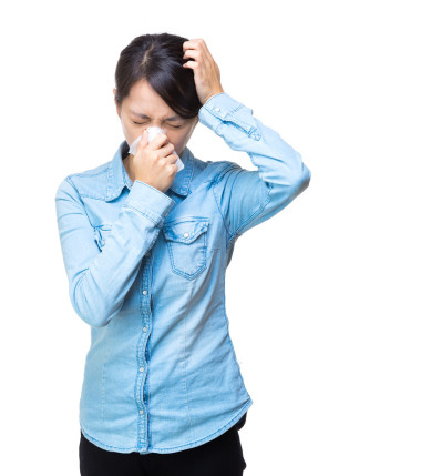 女人打噴嚏、 頭痛圖片