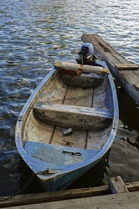 在日落钓鱼船照片