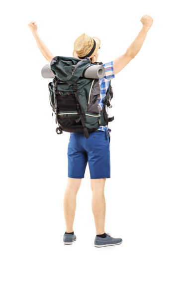 男性的徒步旅行者舉的手圖片