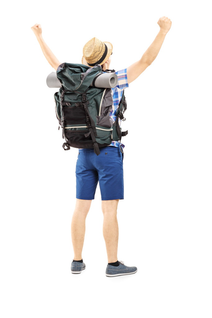 男性的徒步旅行者举的手图片