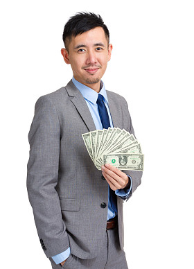 亚洲商人持有现金
