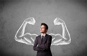 与强劲的肌肉武器商人照片