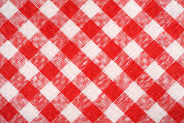 紅色和白色的格子織物。亞麻紅色格子。背景和紋理