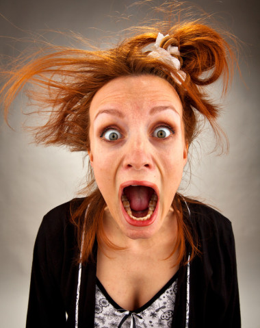 非常驚訝尖叫家庭主婦圖片