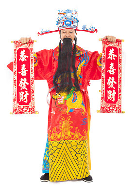 财神抱着祝贺卷轴.照片