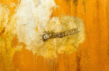 近攝鏡頭的生銹墻背景圖像.圖片