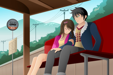 累了的女子睡在公交車站