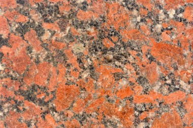 斑驳的黑色和红色花岗岩纹理图片
