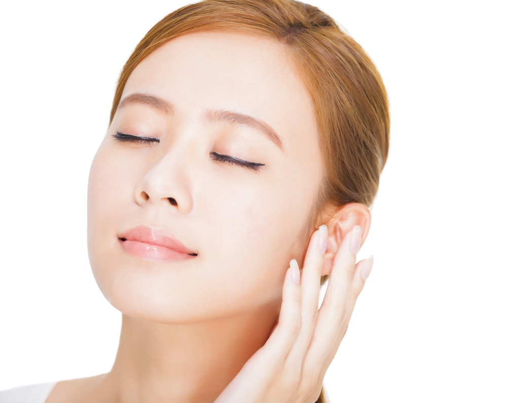 关闭了美丽的年轻女子的脸图片 关闭了美丽的年轻女子的脸图片