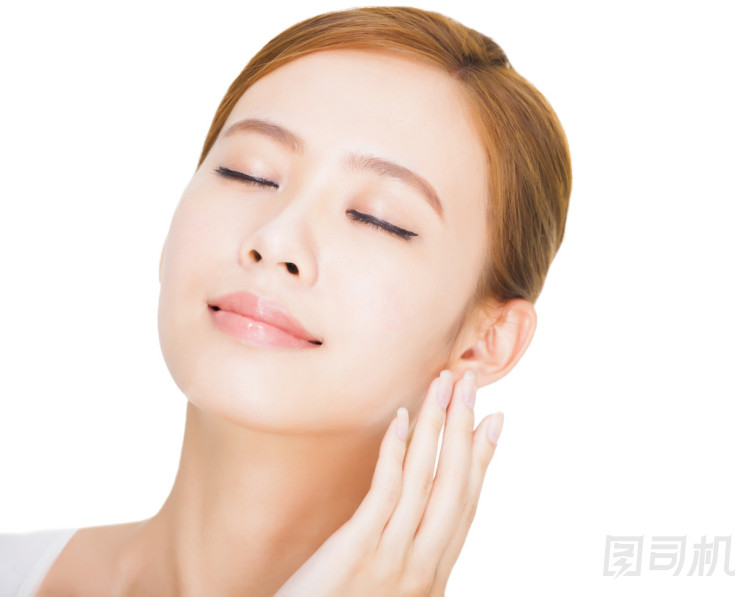 近看美麗的年輕亞洲女人的臉圖片