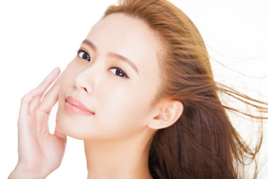 美麗年輕的亞洲女人臉特寫