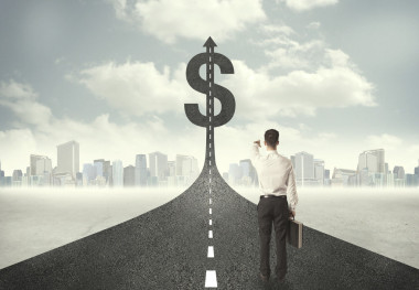 商人在道路走向一个美元符号图片