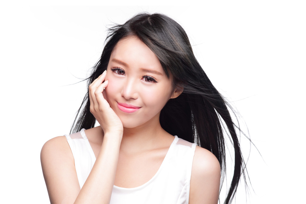 美丽的女人的微笑的脸和长长的头发 美丽的女人的微笑的脸和长长的头发