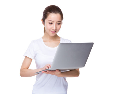便攜式計算機的女人圖片