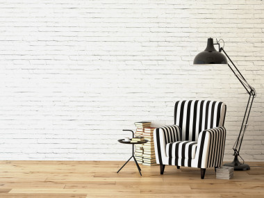 客廳的扶手椅和書籍，3d 渲染