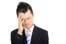 商人与头痛图片