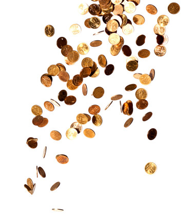 硬币落在白色背景上图片